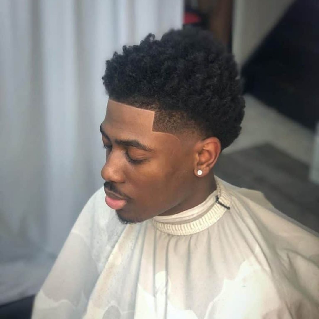 Dégradé sur cheveux afro avec contours nets - Univers Coiffure Bry-sur-Marne